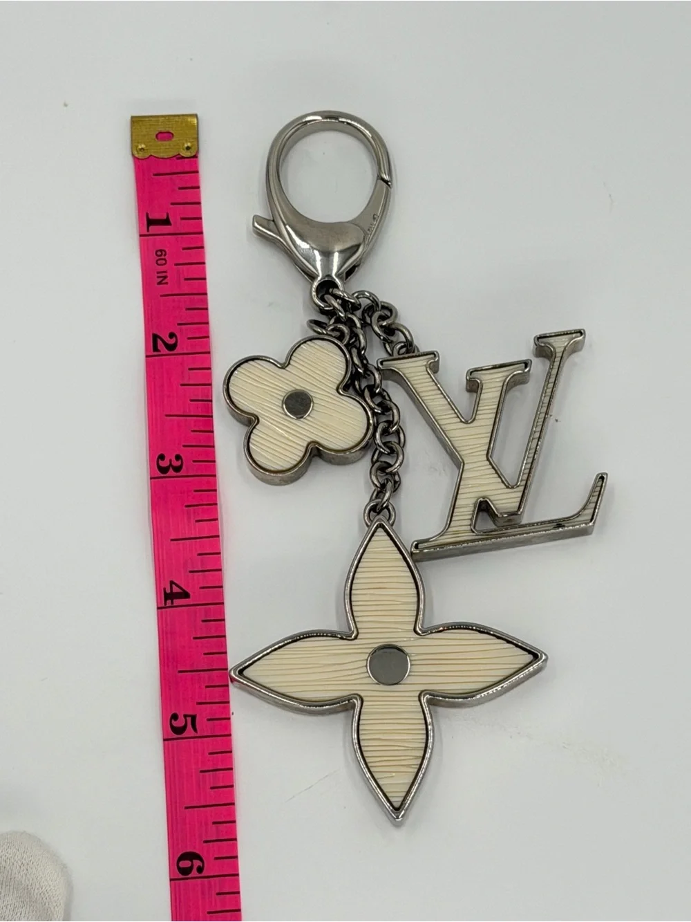 Authentic Louis Vuitton Fleur d’Epi Silver & Cream Bag Charm w/Dust Bag and COA